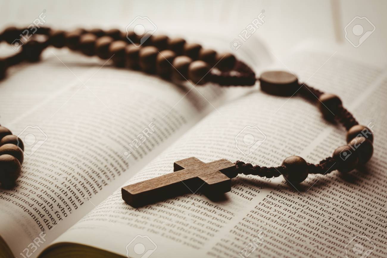 open bible and wooden