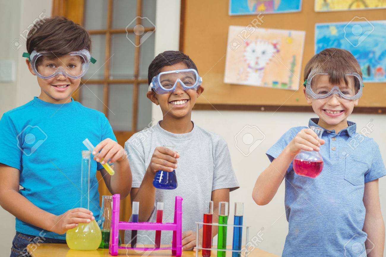 Pupils at science lesson in classroom at the elementary school - 44850830 Pupils at science lesson in classroom at the elementary school - 44850830