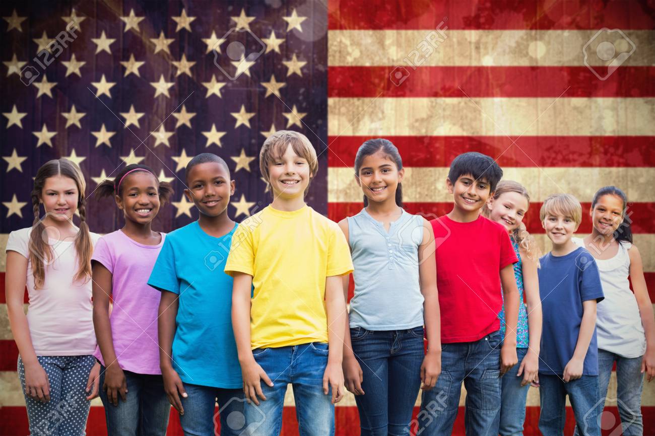 Happy friends playing in the park against usa flag in grunge effect - 43913175