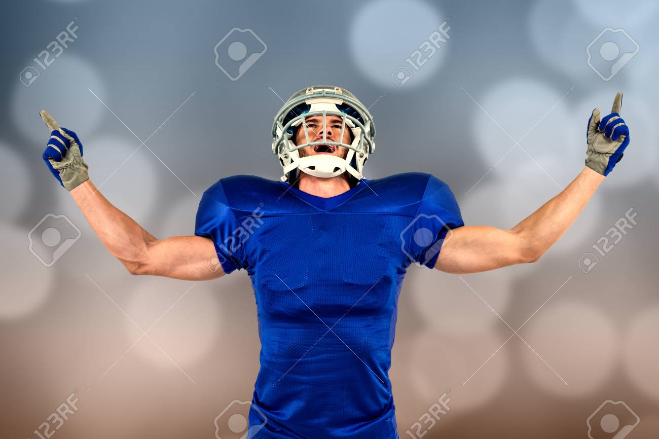 Happy American Football Player With Arms Outstretched Against Glowing  Background Stock Photo, Picture And Royalty Free Image. Image 49106159.