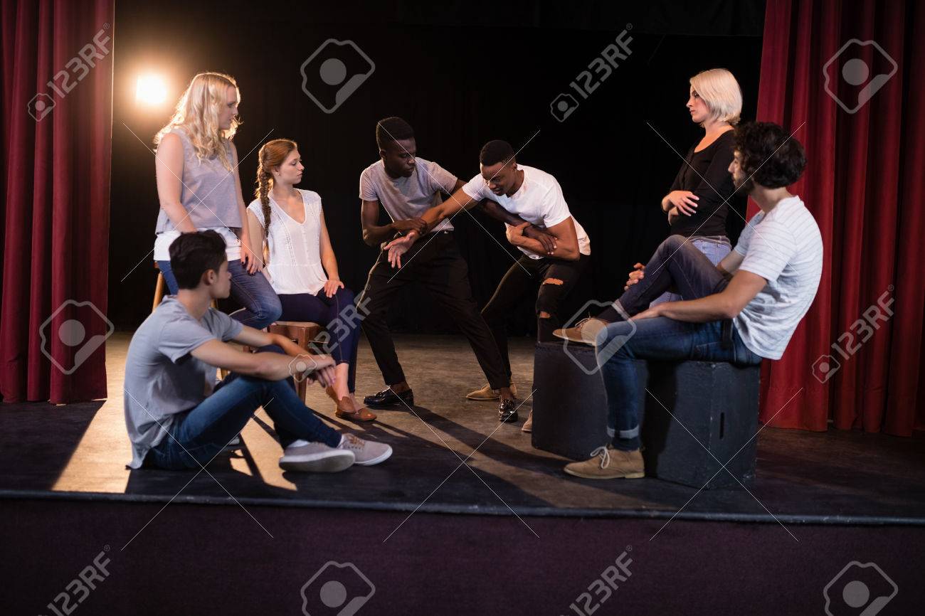 Actors practicing play on stage in theatre - 84503007 Actors practicing play on stage in theatre - 84503007