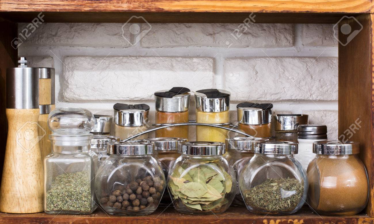 Set of various spices in jars on k itchen shelf - 60069972 Set of various spices in jars on k itchen shelf - 60069972