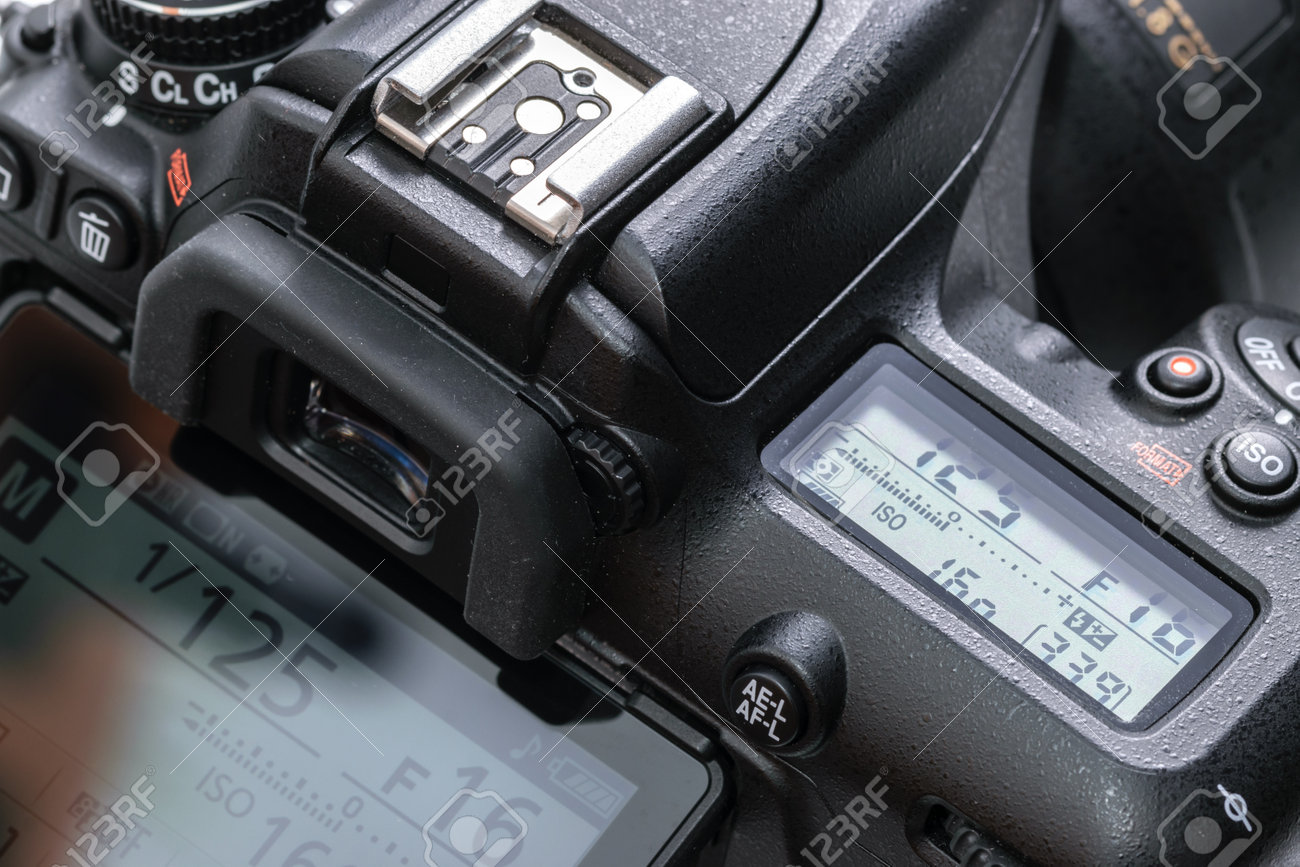Krakow, Poland - April 09, 2021: Close-up of a modern Nikon D7500 DSLR camera isolated on a white background. Nikon is a famous Japanese corporation specializing in optics and imaging products - 167419145 Krakow, Poland - April 09, 2021: Close-up of a modern Nikon D7500 DSLR camera isolated on a white background. Nikon is a famous Japanese corporation specializing in optics and imaging products - 167419145