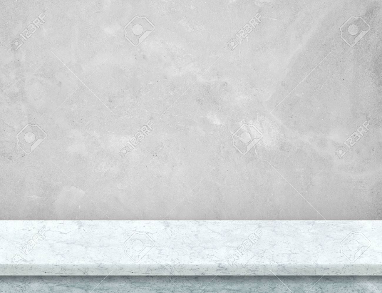 Empty whtie marble table top with grey concrete wall,Mock up for display or montage of product,use as background. - 70672259 Empty whtie marble table top with grey concrete wall,Mock up for display or montage of product,use as background. - 70672259