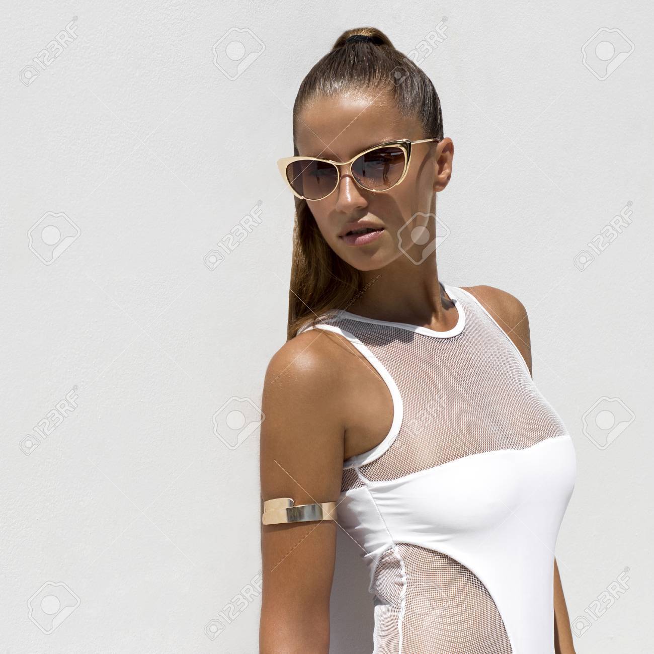 gafas de sol doradas mujer