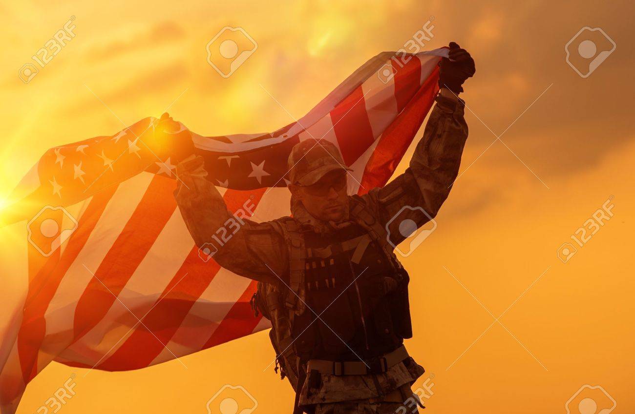 Soldier Celebrating Victory Running with Large American Flag. Trooper with the Flag. - 58950898 Soldier Celebrating Victory Running with Large American Flag. Trooper with the Flag. - 58950898