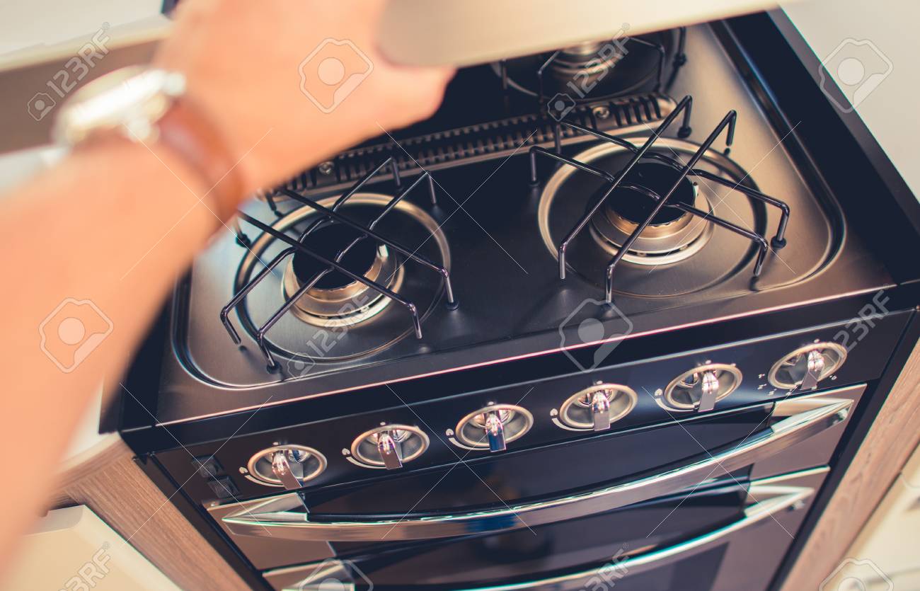 Rv Propane Stove >> Checking On Camper Rv Propane Stove Cooking While Travel Theme Rv Propane Stove >> Checking On Camper Rv Propane Stove Cooking While Travel Theme