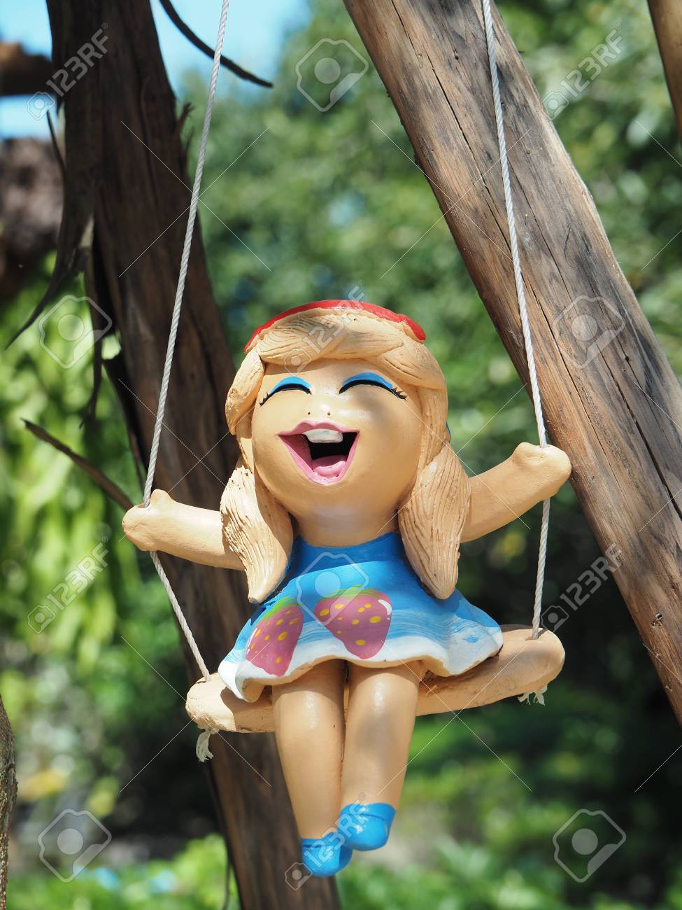 doll on a swing