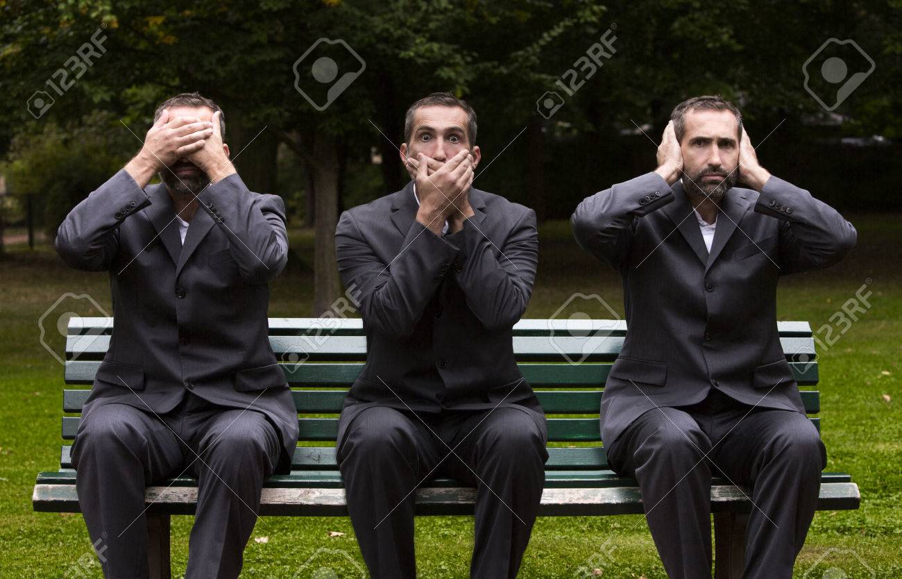 businessman sitting on a bench three times covering his ears,eyes and mouth - 31775270 businessman sitting on a bench three times covering his ears,eyes and mouth - 31775270