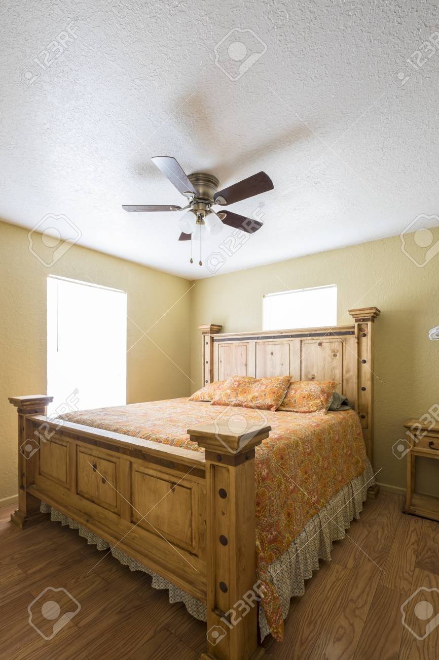 Usa Texas Rustic Bedroom Interior With Ceiling Fan Stock Photo