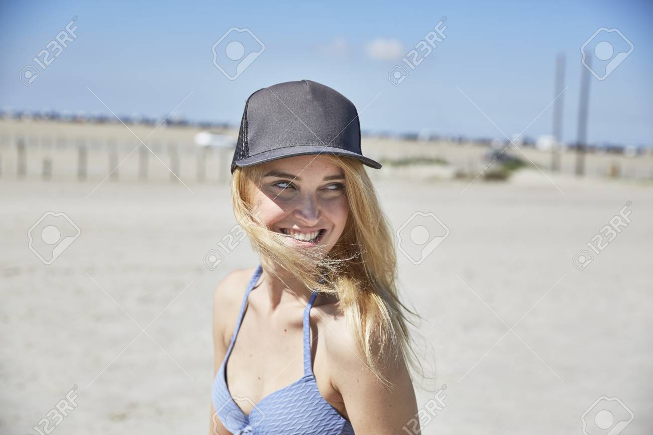 woman wearing baseball cap