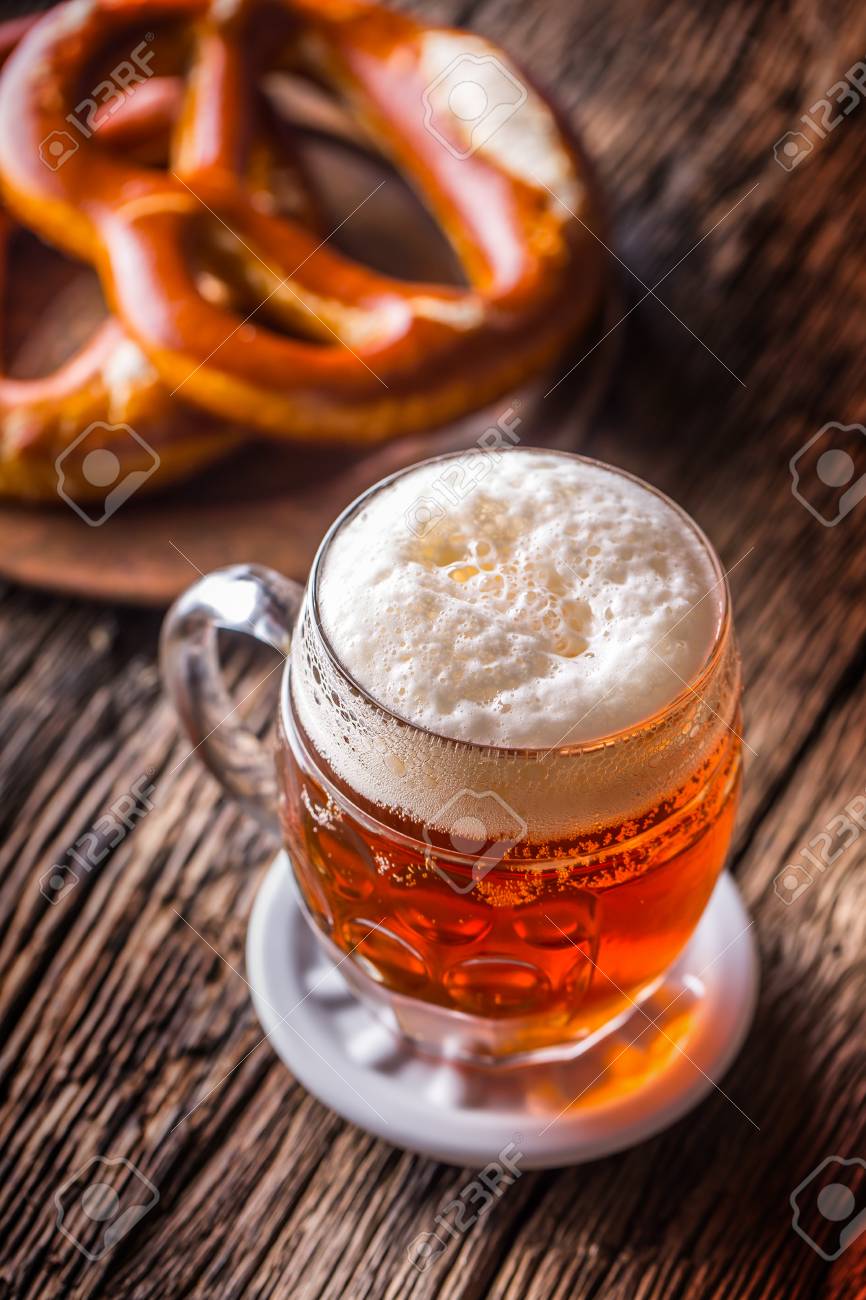 beer and oktoberfest draft beer pretzel and blue checkered