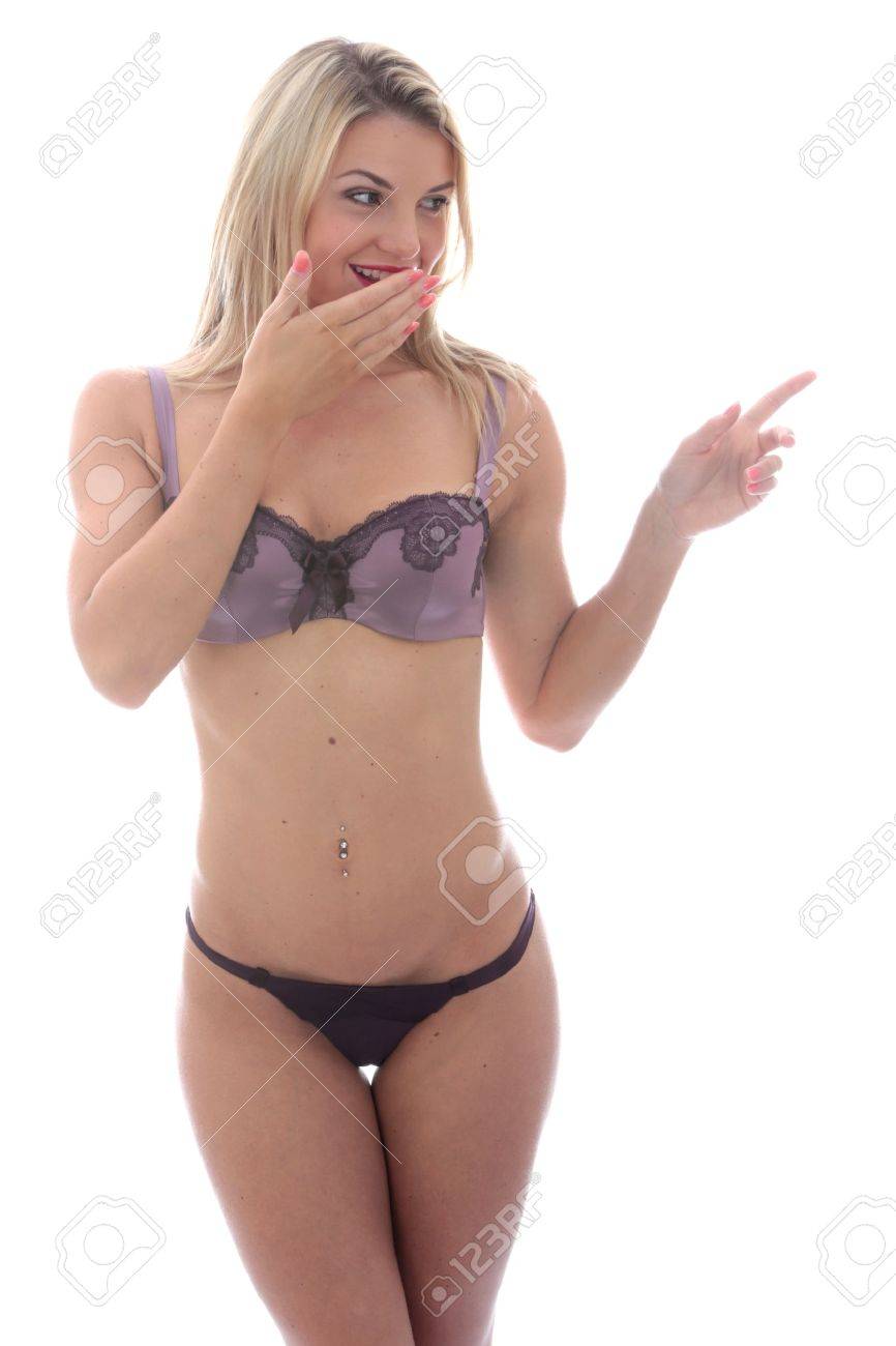 Mujer Joven Que Señala En Lencería Fotos, Retratos, Imágenes Y Fotografía De Archivo Libres De Derecho. 20871077.
