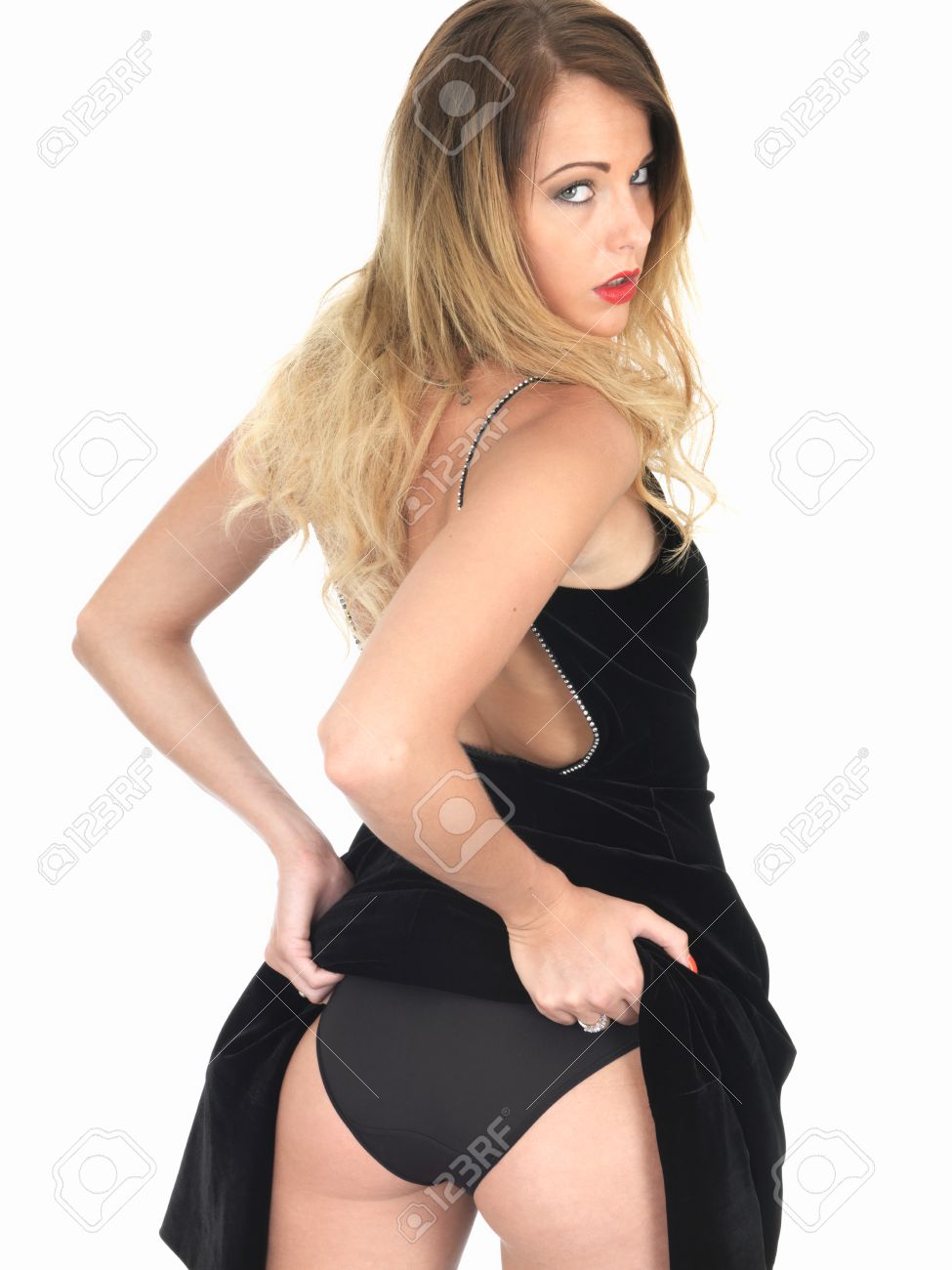 wife lifts her dress