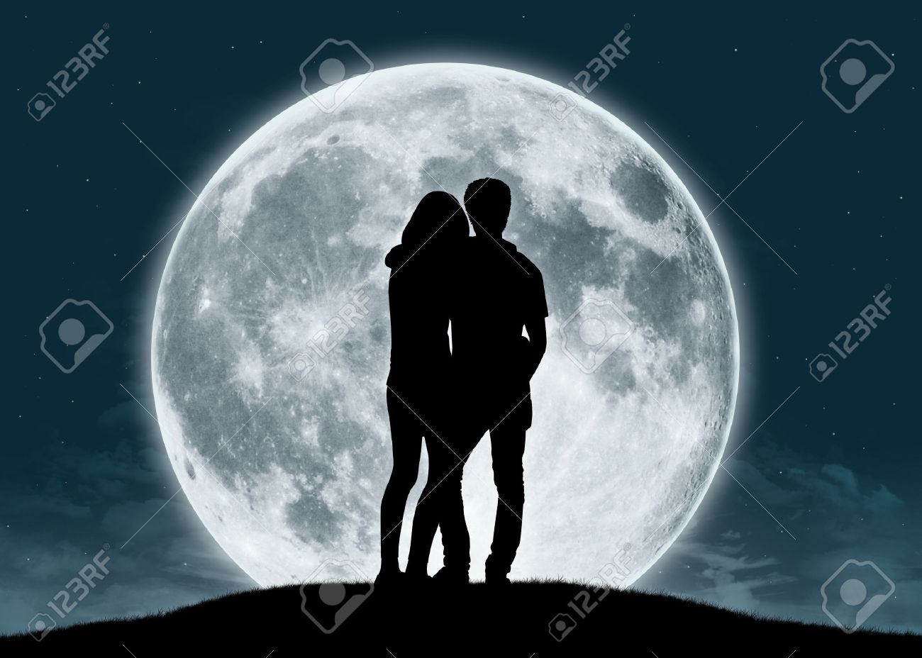 Silhouette Of A Young Couple In Love Looking At The Full Moon Stock Photo Picture And Royalty Free Image Image 25244889