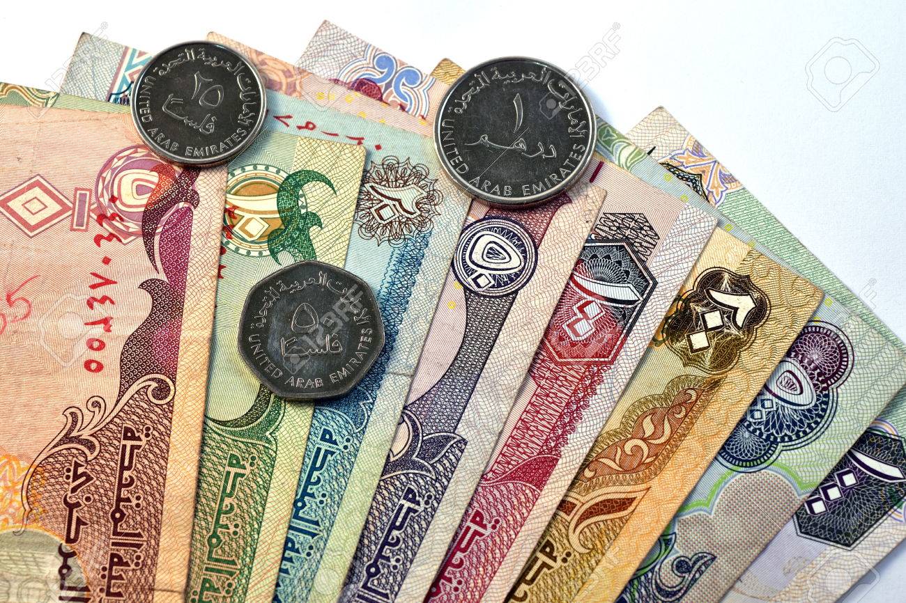 Close Up Different Dirhams Currency Note And Coins, United Arab Emirates  Close Up Different Dirhams Currency Note And Coins, United Arab Emirates  Stock Photo, Picture and Royalty Free Image. Image 55254336., image size:1300x866
