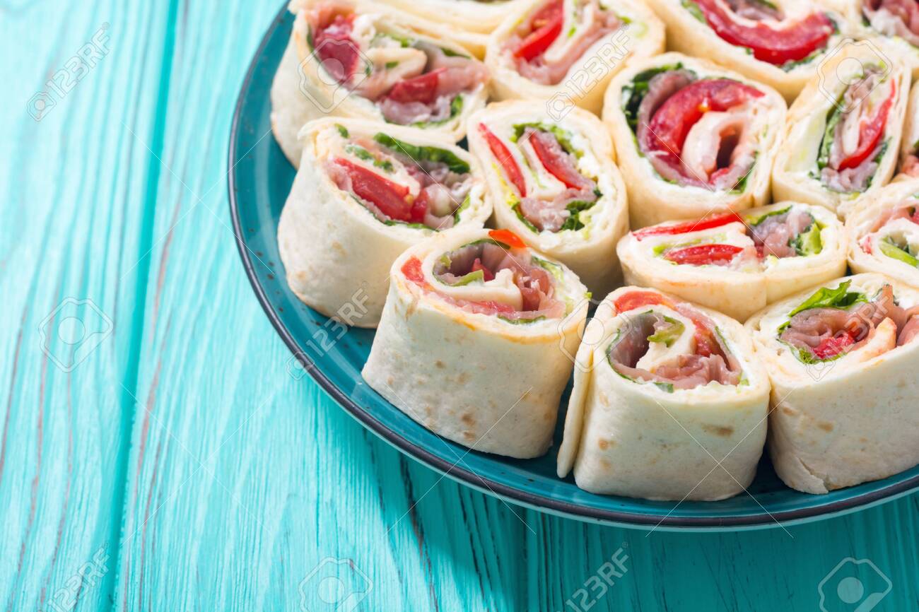 Sliced Sandwich Tortilla With Tomatoes Salad Cream Cheese Stock Photo Picture And Royalty Free Image Image 127419848