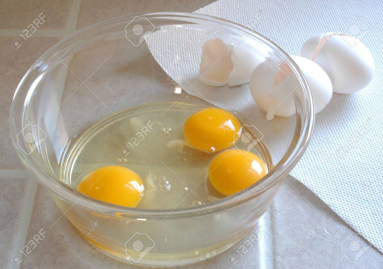 Three Eggs in Bowl with Cracked Egg Shells by Kitchen Window - 624425 Three Eggs in Bowl with Cracked Egg Shells by Kitchen Window - 624425