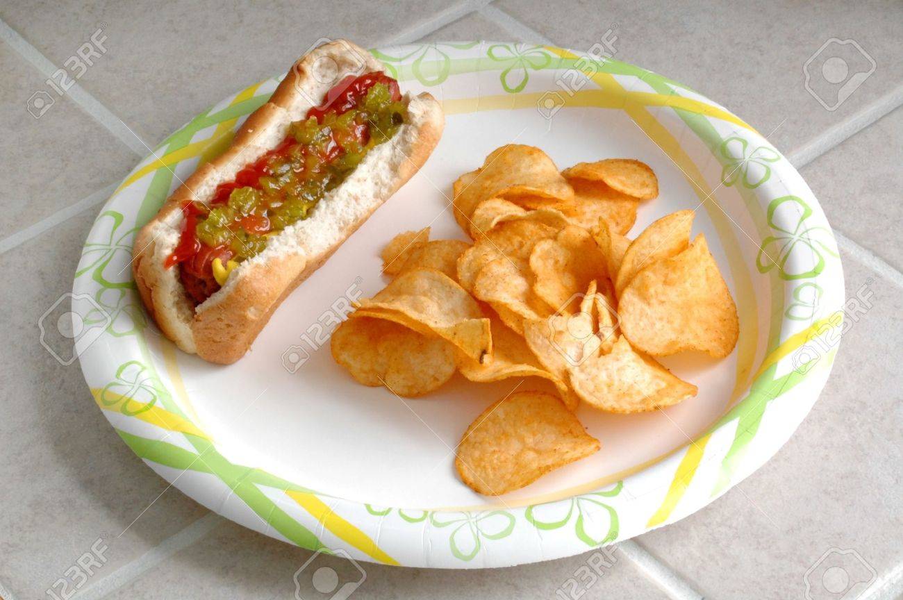 Hotdog and Chips on a Plate on the Counter - 712777 Hotdog and Chips on a Plate on the Counter - 712777