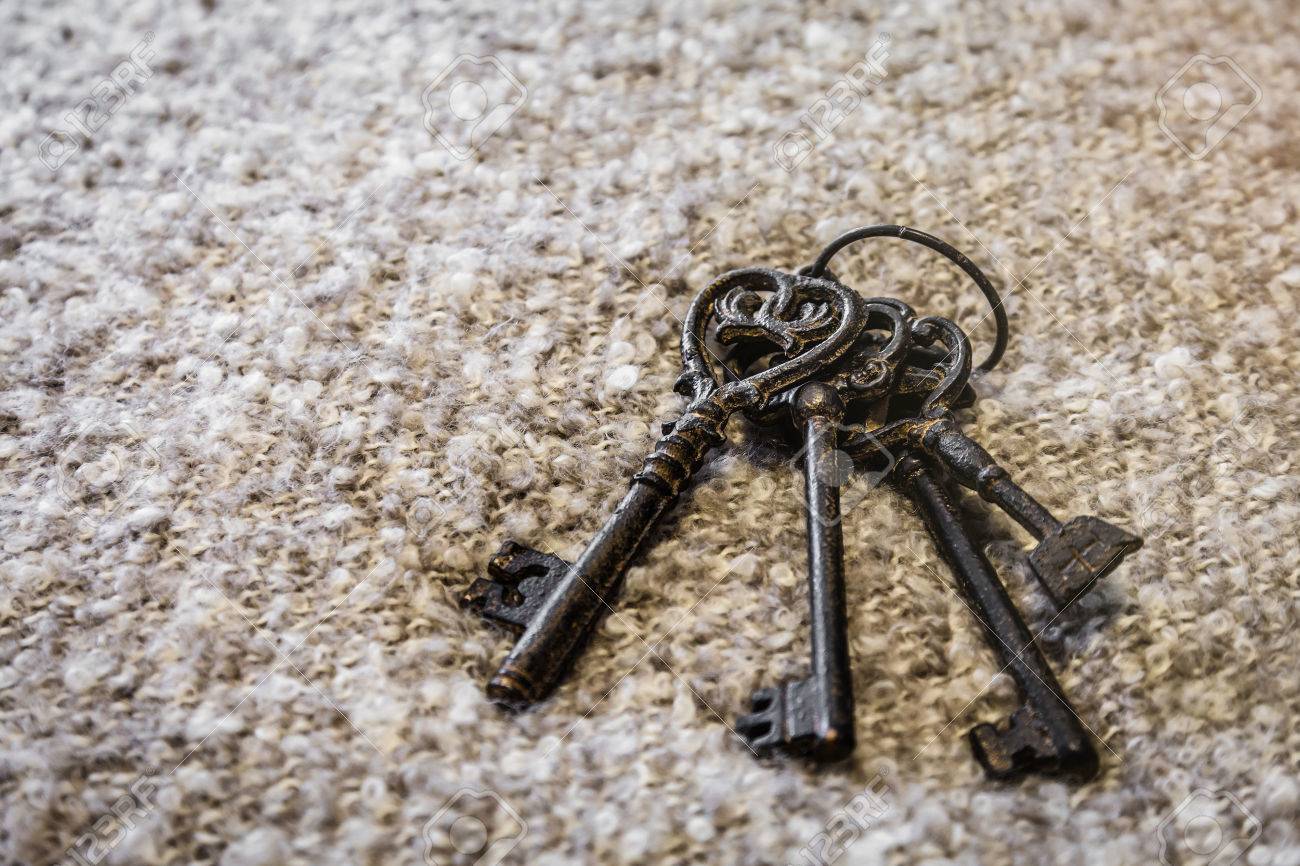 Antique And Rusty Medieval Castle Skeleton Door Keys With Old Antique and rusty medieval castle skeleton door keys with old corroded metal ring on antique weathered - Antique And Rusty Medieval Castle Skeleton Door Keys With Old