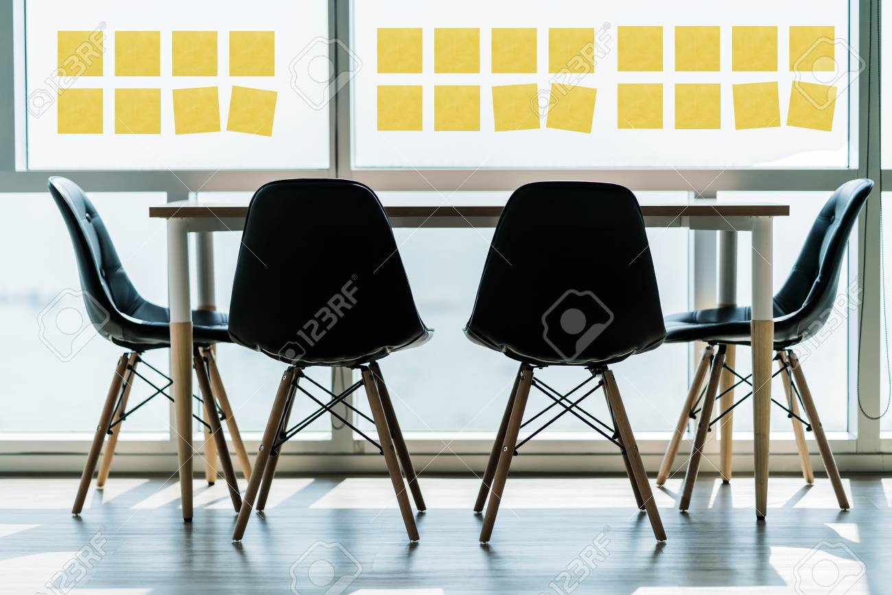 modern wooden table with dining chair near big window office stock window office free