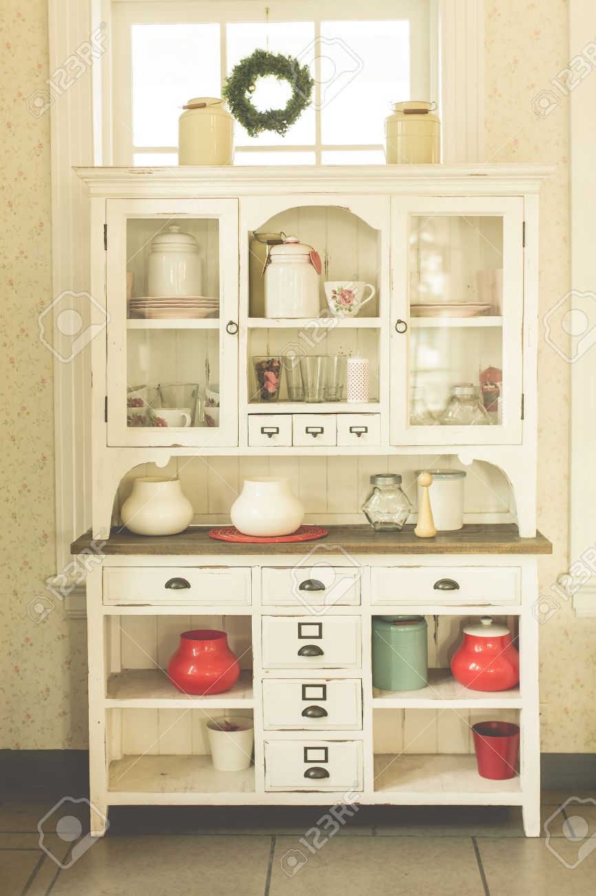 Antique Kitchen Cabinet And Old Style Kitchen Ware In Pastel