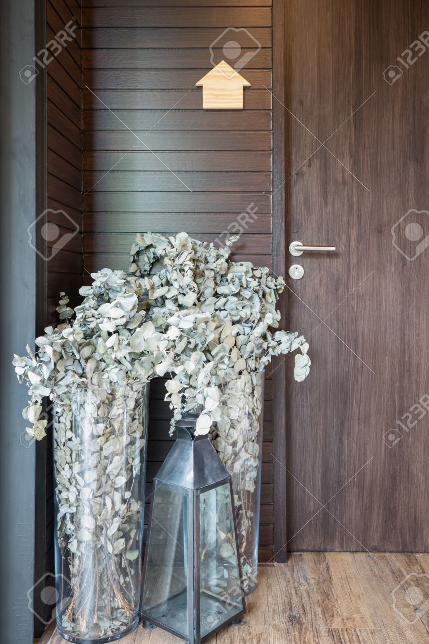 Dried Flowers In Tall Vases And Glass Candle Lamp Decorated