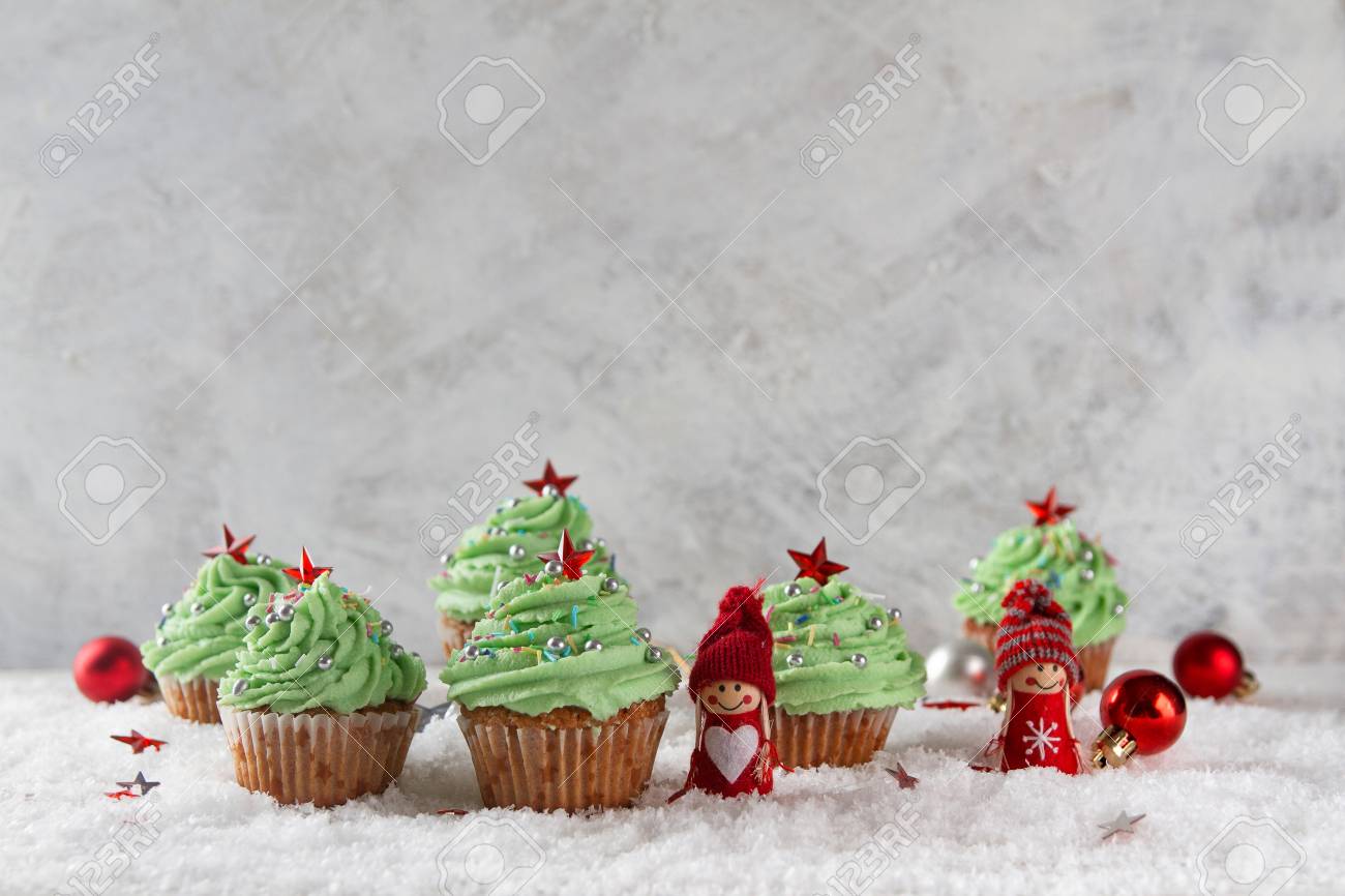 Christmas Cupcake With Green Buttercream Icing And Decoration Selective Focus Stock Photo Christmas Cupcake With Green Buttercream Icing And Decoration Selective Focus Stock Photo