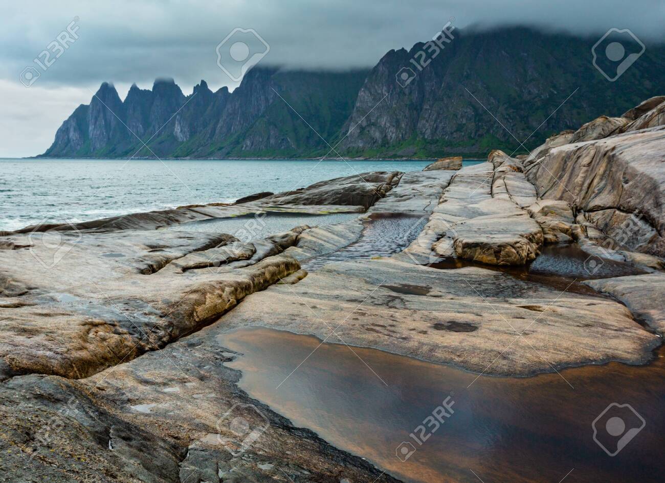 Stony Beach With Tidal Baths At Ersfjord Senja Norway Summer Stock Photo Picture And Royalty Free Image Image