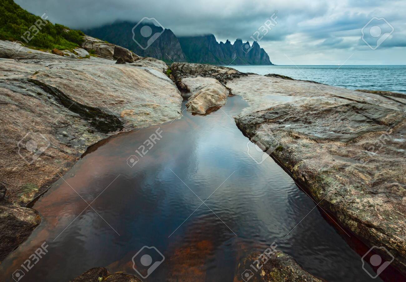 Stony Beach With Tidal Baths At Ersfjord Senja Norway Summer Stock Photo Picture And Royalty Free Image Image