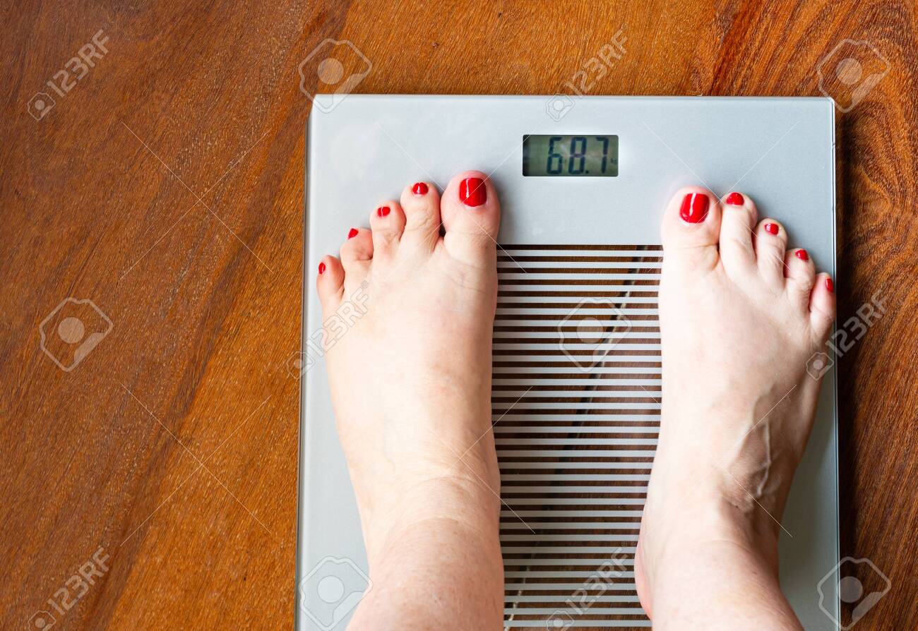 Feet Of A Woman Who Wants To Lose Weight On A Scale Stock Photo Picture And Royalty Free Image Image