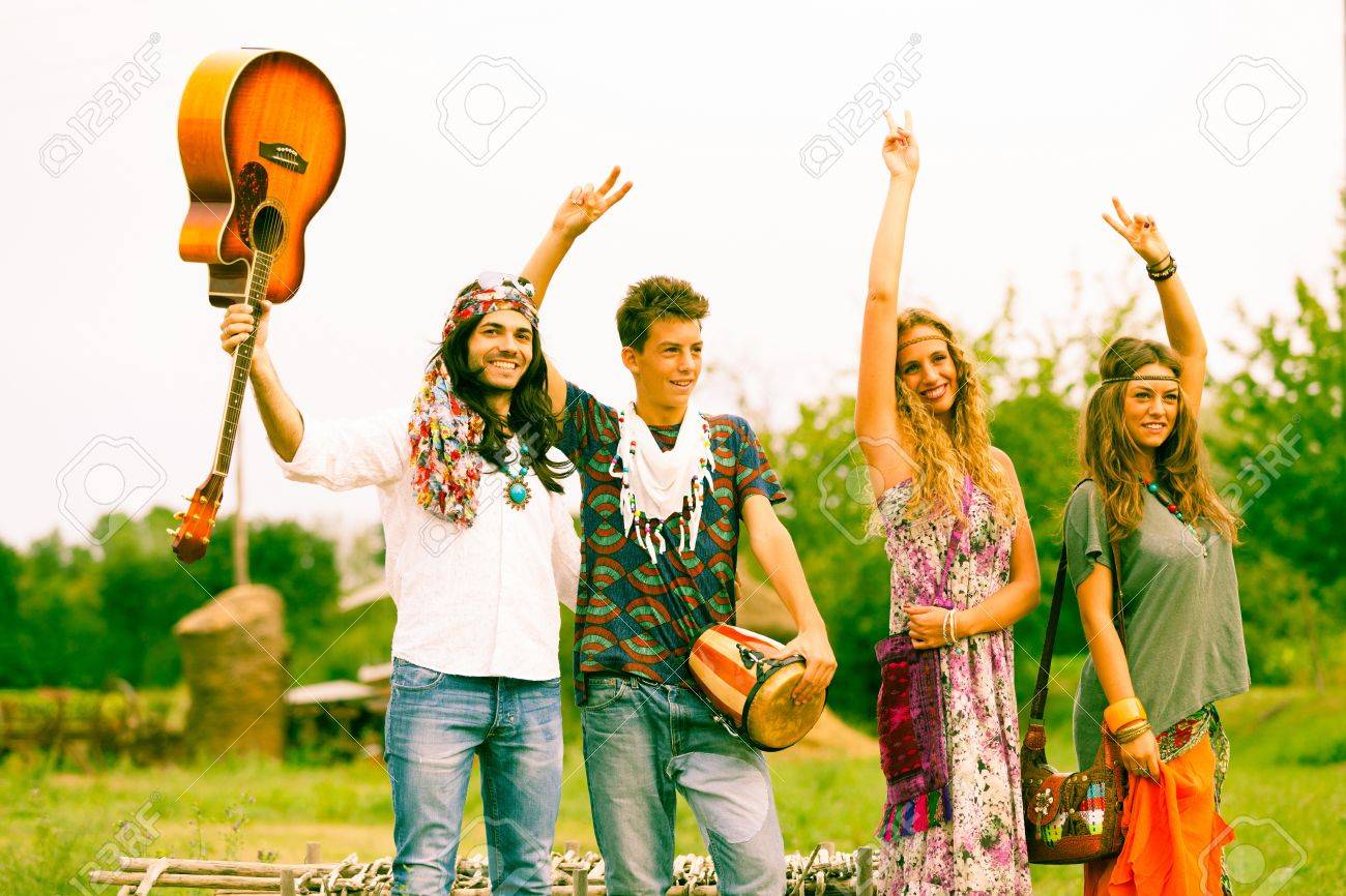 hippi group dancing in the countryside stock photo picture and