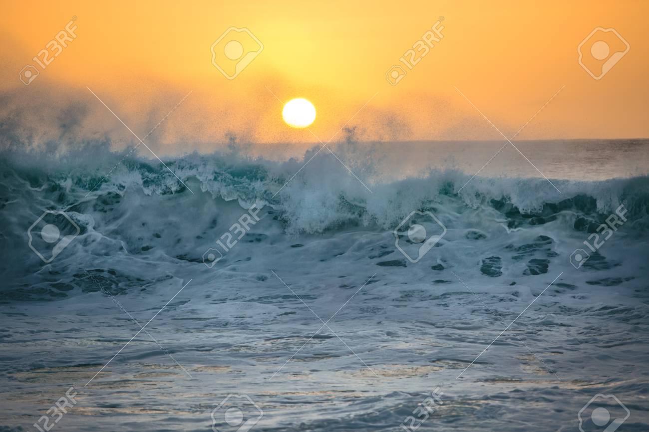 Beautiful Storming Ocean Wave Against Sunset Sea Water In Rough Stock Photo Picture And Royalty Free Image Image
