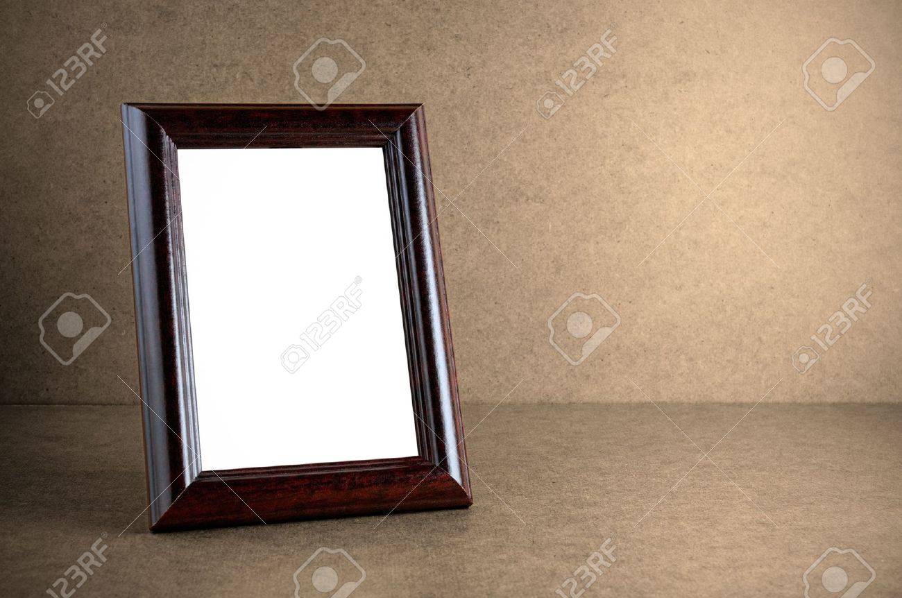 Old wooden photo frame on grunge background - 12748596 Old wooden photo frame on grunge background - 12748596