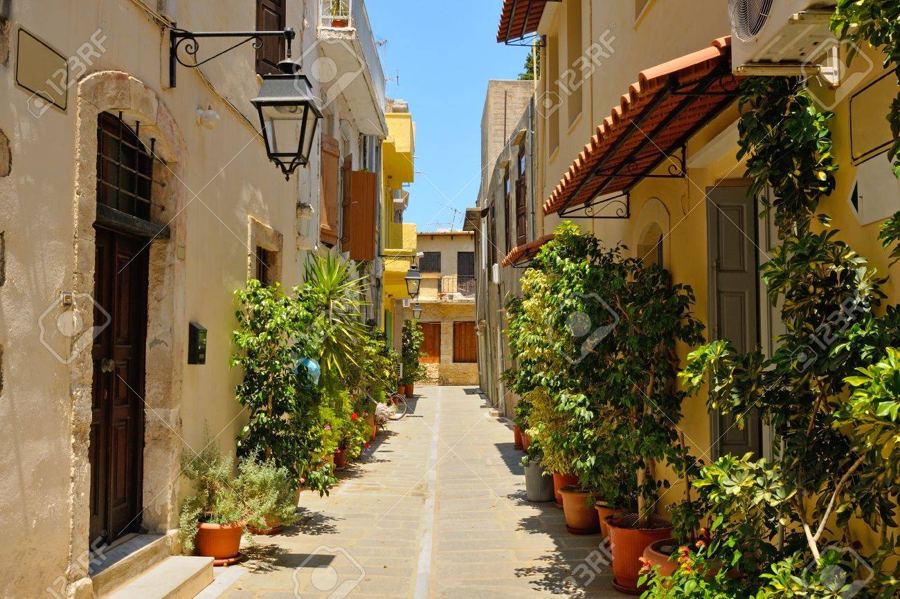Typical narrow street in city of Rethymno, Crete, Greece - 21436584 Typical narrow street in city of Rethymno, Crete, Greece - 21436584