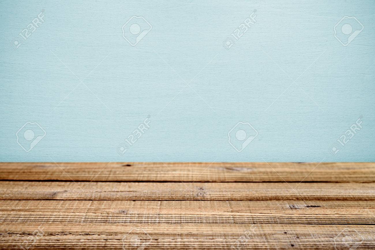 old wooden table near wall shallow depth of field stock photo