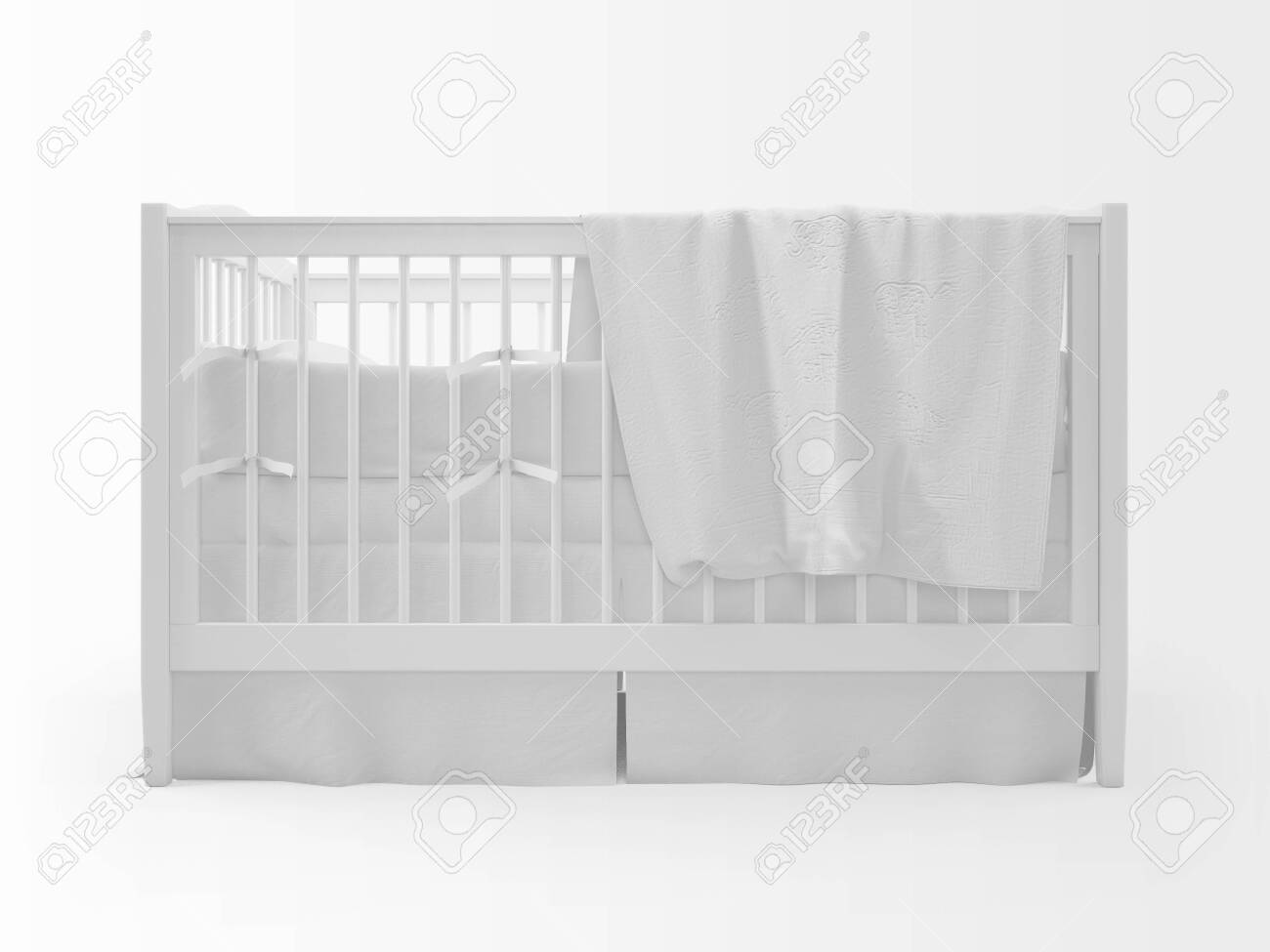 white cot with mattress