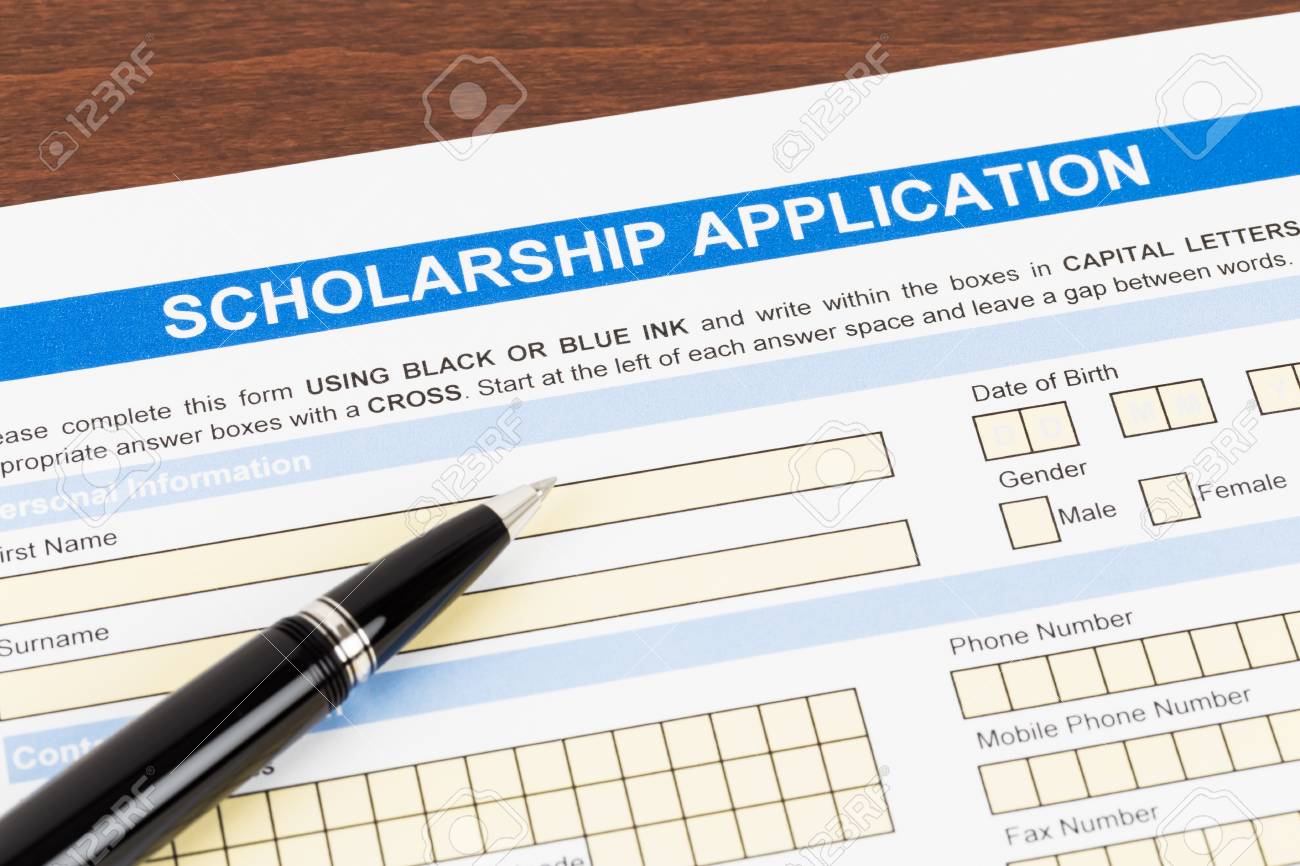 scholarship application form with pen stock photo picture and