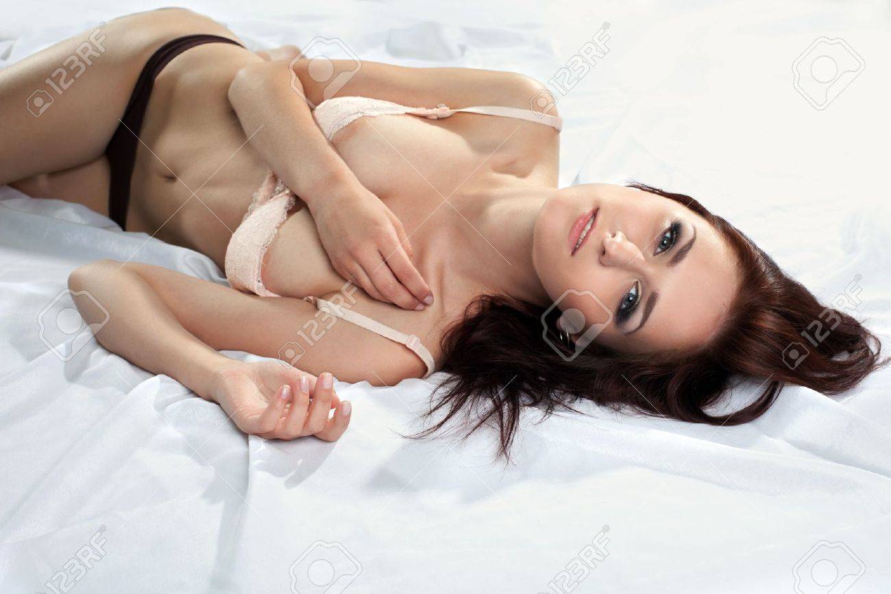 Pretty Sexy Young Woman On Silk Undress Bra With Desire Stock Photo, Picture and Royalty Free Image