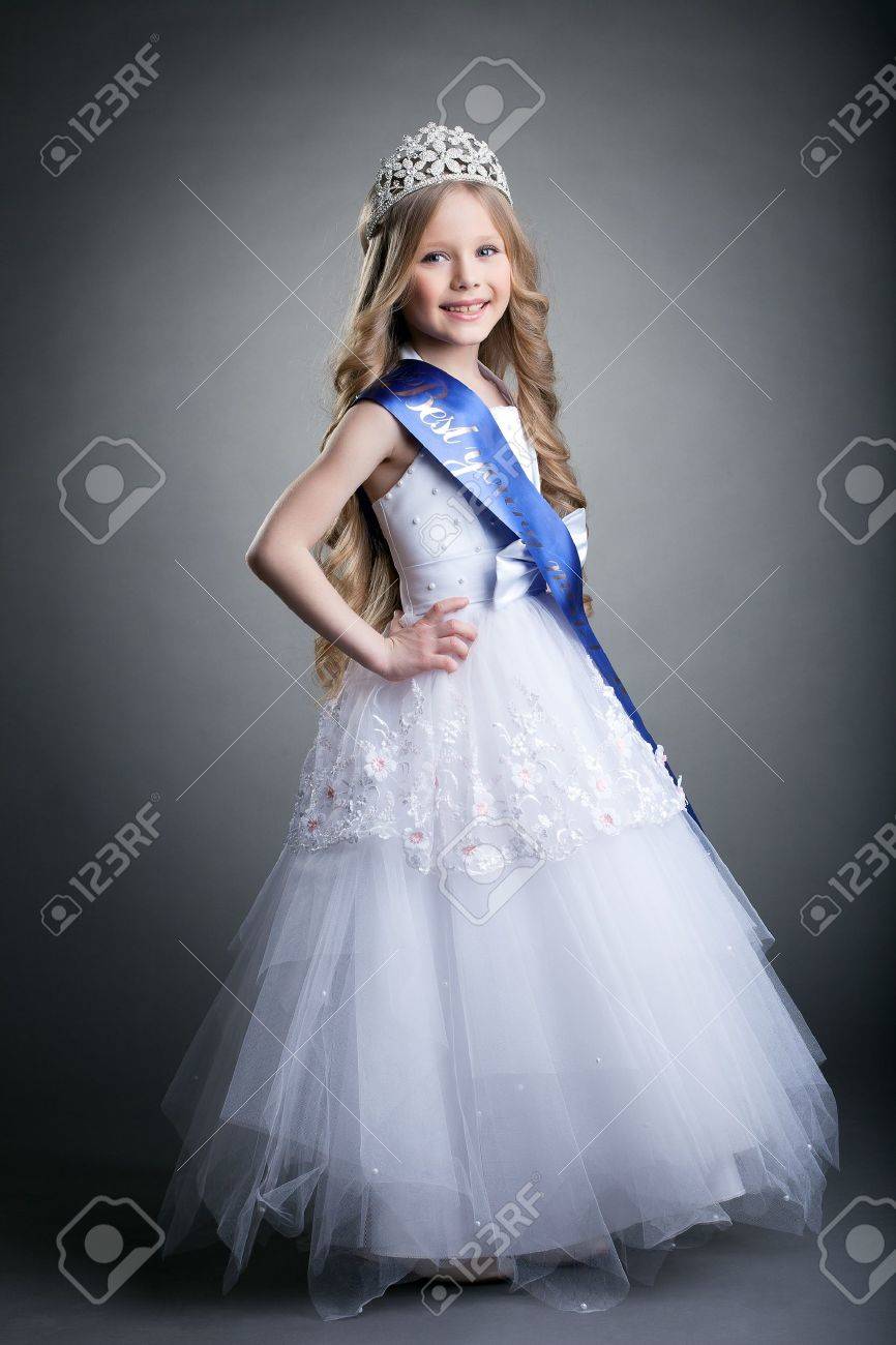 Full length portrait of pretty little girl in tiara and long white dress - 17533736 Full length portrait of pretty little girl in tiara and long white dress - 17533736