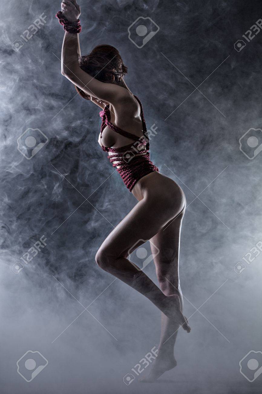 Nude girl tied jump rope