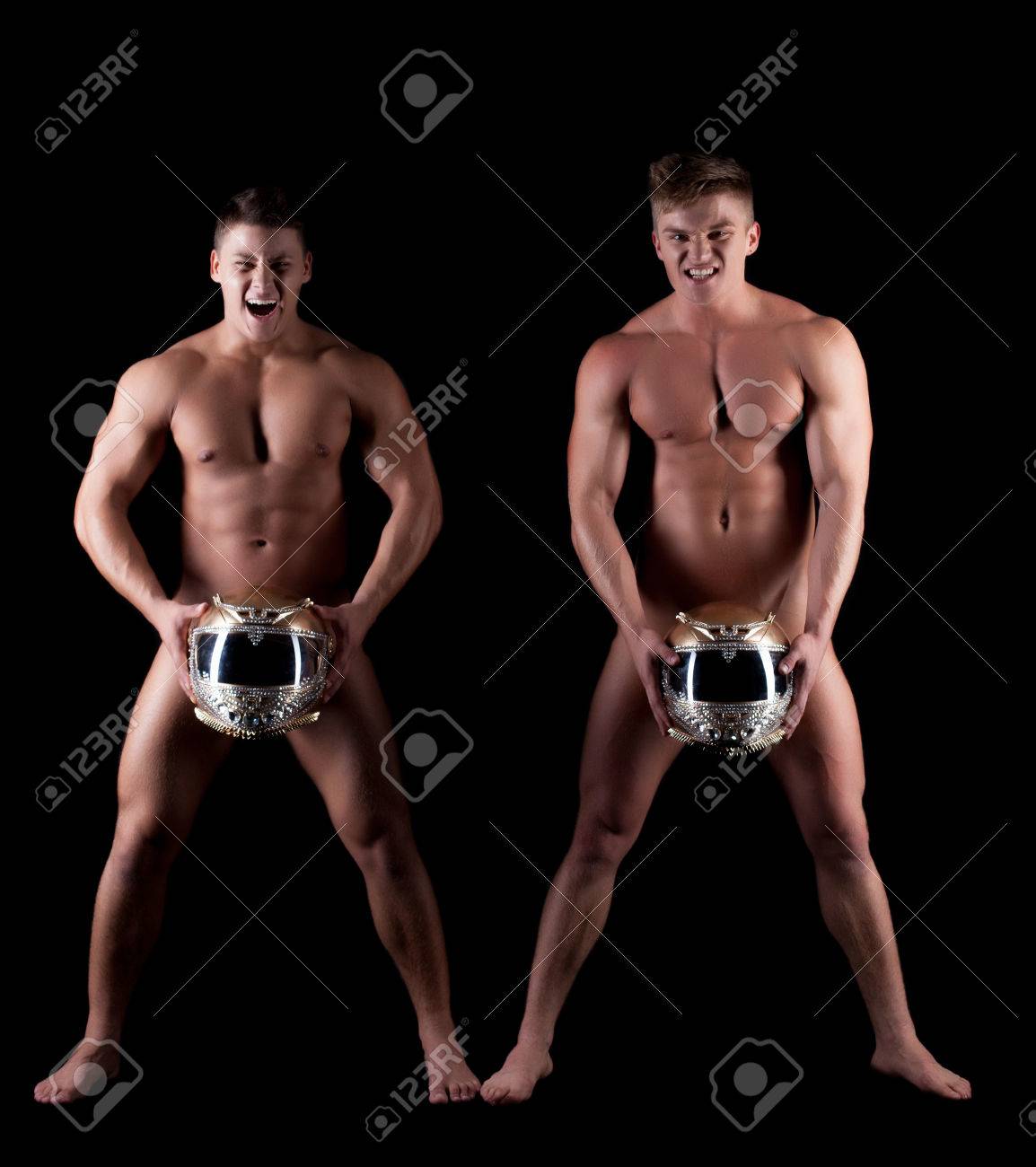 Image Of Emotional Naked Men Posing With Helmets, Isolated On Black Stock  Photo, Picture and Royalty Free Image. Image 26638005.