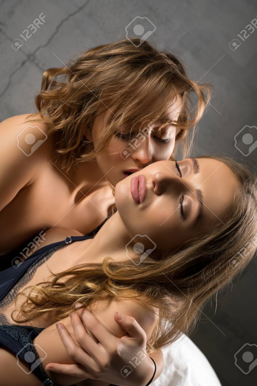 Two Sexy Girls Wrapped In A Steamy Embrace Stock Photo, Picture and Royalty  Free Image. Image 111756532.