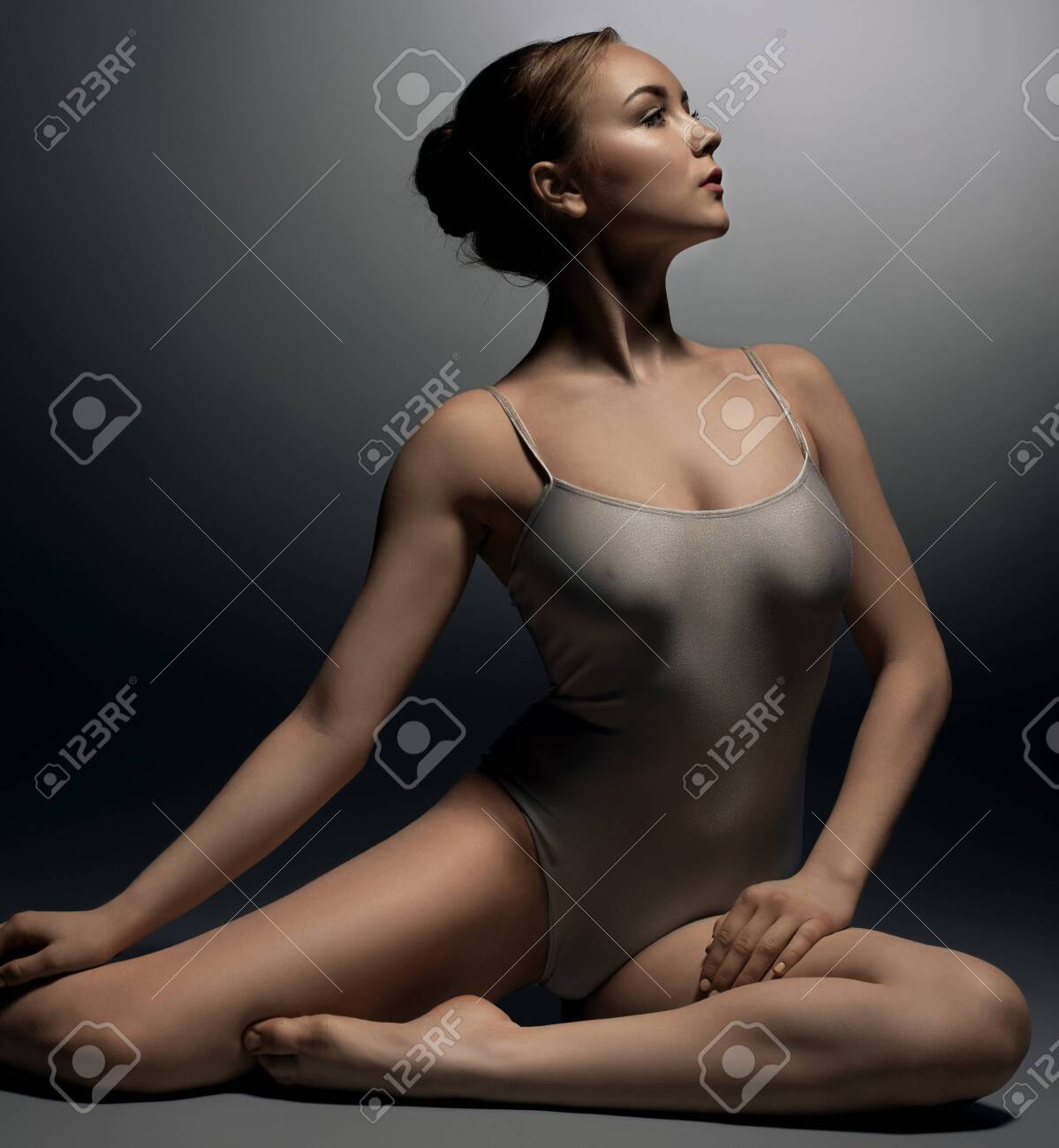 Sexy Gymnast In Ecru Bodysuit In Split In Profile Stock Photo Picture And Royalty Free Image Image Sexy Gymnast In Ecru Bodysuit In Split In Profile Stock Photo Picture And Royalty Free Image Image