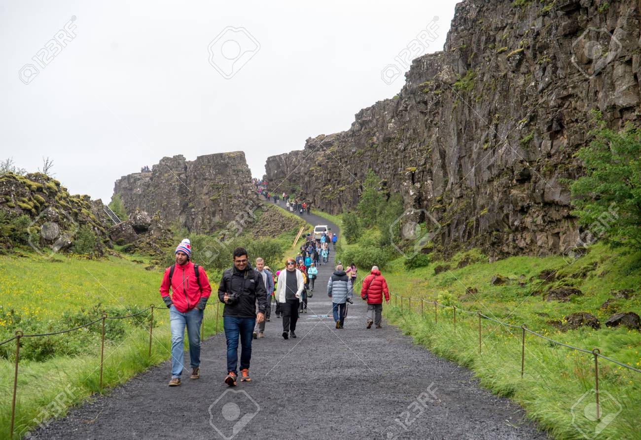 Thingvellir Iceland July 19 2017 Tourists Walk Through The Almannagja Fault Line In The Mid Atlantic Ridge North American Plate In Thingvellir National Park Iceland Stock Photo Picture And Royalty Free Image Image 97343334