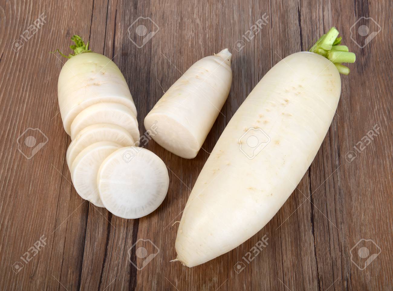 Daikon Radishes Isolated On White Background Stock Photo Picture And Royalty Free Image Image