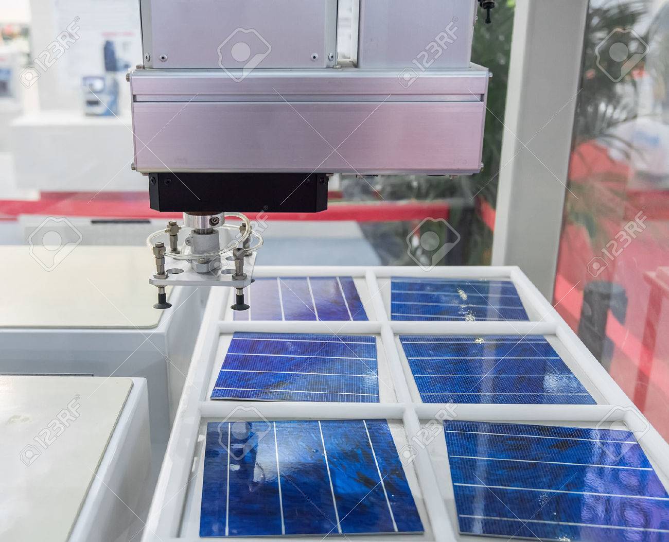 production of solar panels, Industrial robot working in factory,Conveyor Tracking Controler of robotic hand. - 59453036 production of solar panels, Industrial robot working in factory,Conveyor Tracking Controler of robotic hand. - 59453036