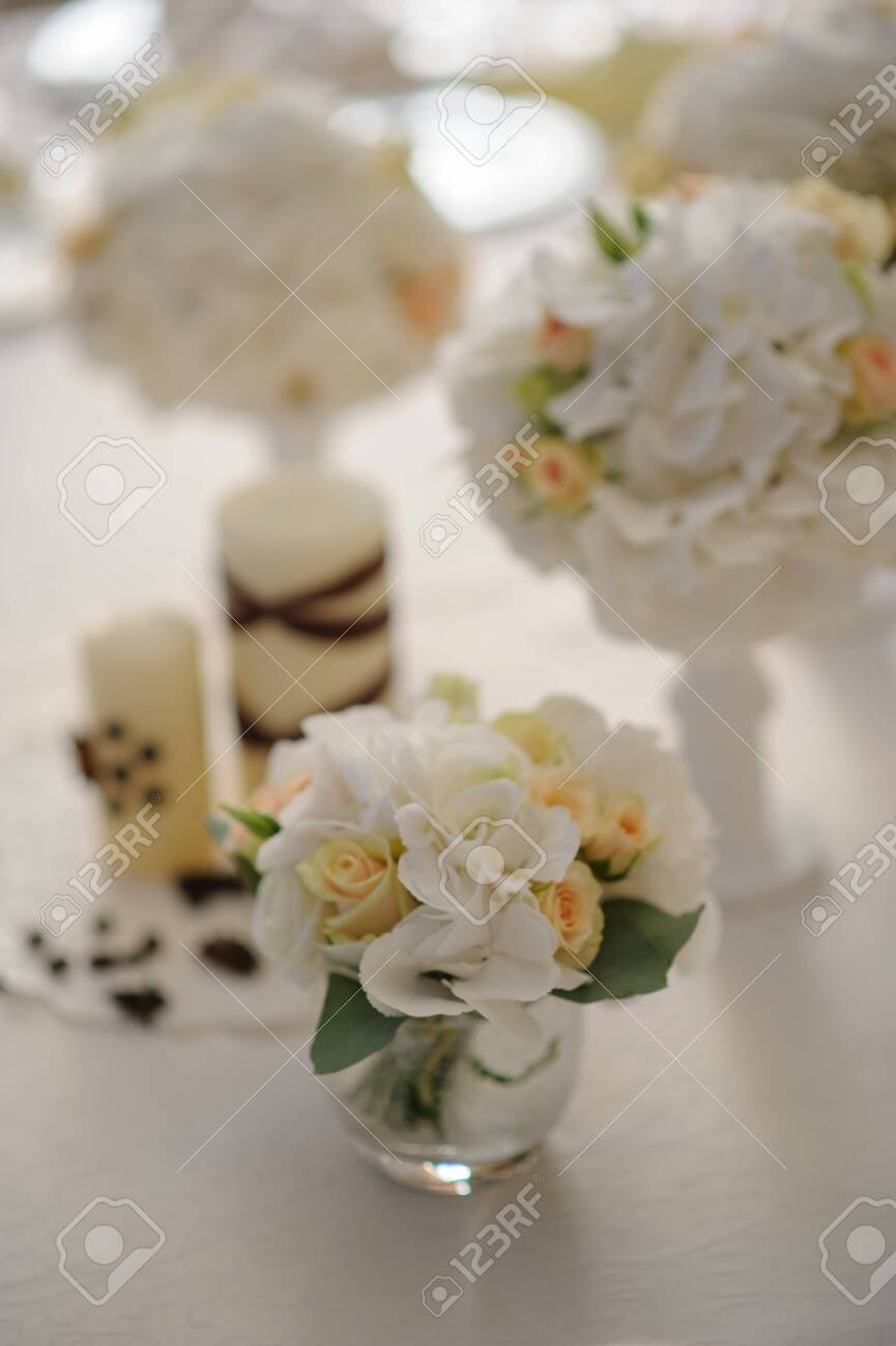 Beautiful flowers on table in wedding day - 138724874 Beautiful flowers on table in wedding day - 138724874