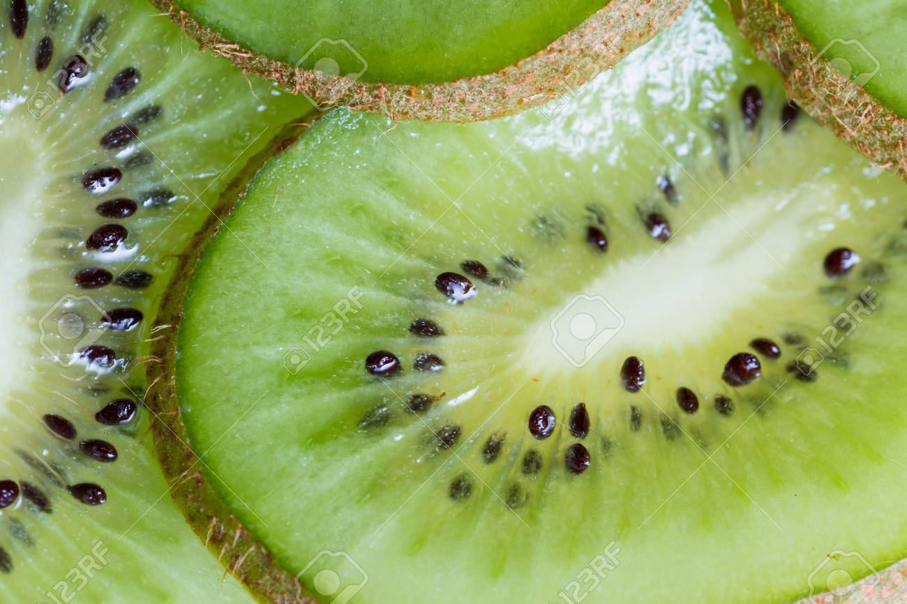 https://previews.123rf.com/images/wollertz/wollertz1603/wollertz160300285/53696726-close-up-of-a-fresh-kiwi-sliced-in-half-revealing-a-beautiful-pattern-and-texture-on-the-inside.jpg