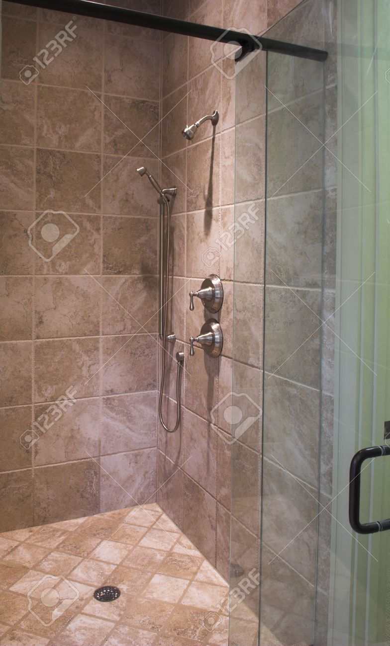 Luxury Tile Showers luxury tile shower with glass door stock photo, picture and Luxury Tile Showers luxury tile shower with glass door stock photo, picture and